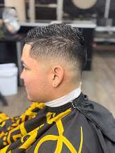 Fresh fade haircut finished at Millennium Barbershop